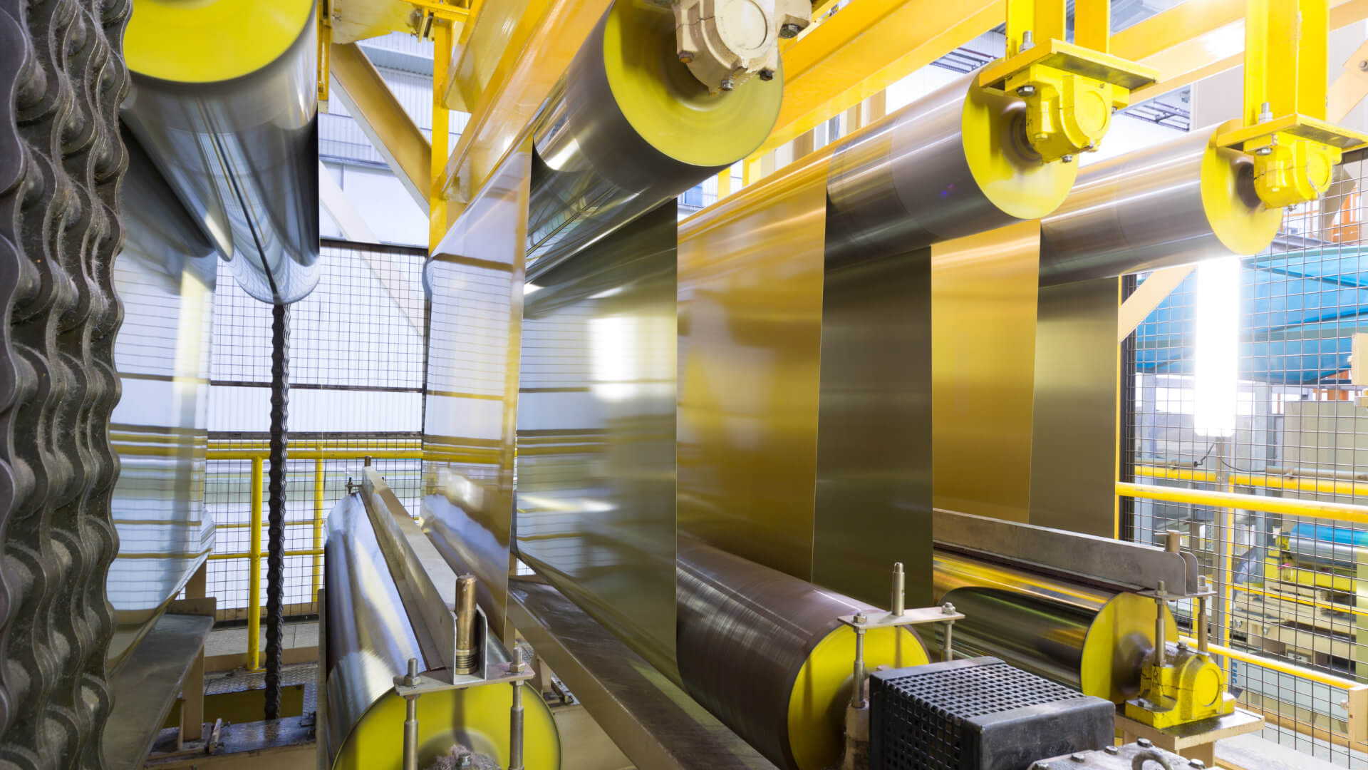 Production line closeup with rollers that are controlled by planetary speed reducers